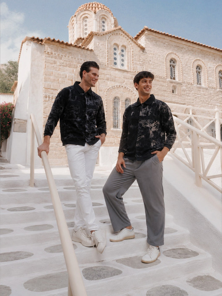 The overshirt in Steel Gray and Buff Orange, worn on church steps in Greece